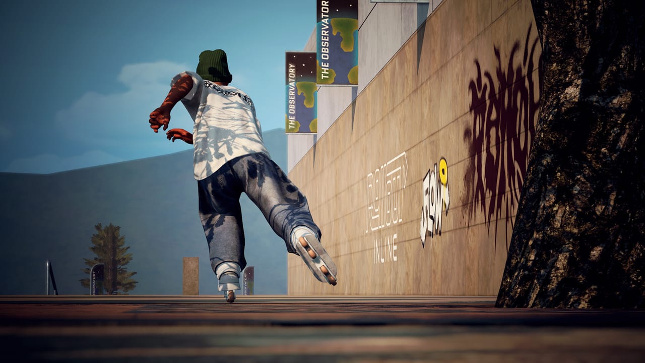 Rollout Inline skater grinding a rail in a colorful skatepark